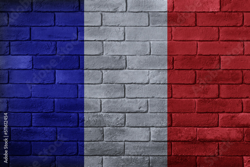 france flag painted on a brick wall