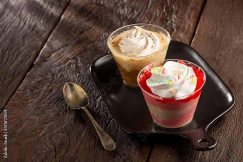 Desserts in the pot in banana and strawberry flavors. photo