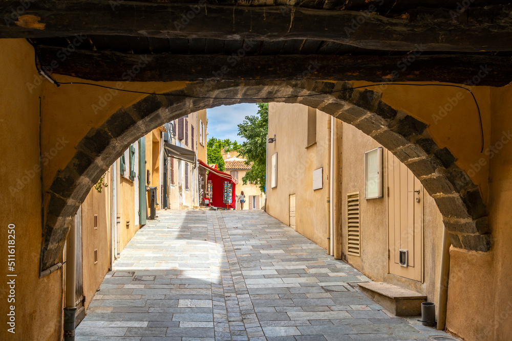 The picturesque old town center of Grimaud, a medieval historic village below the Grimaud castle in the hills and countryside above Saint-Tropez France on the French Riviera.