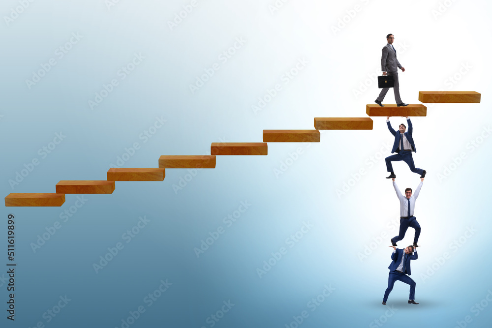 Fototapeta premium Teamwork concept with businessmen helping each other