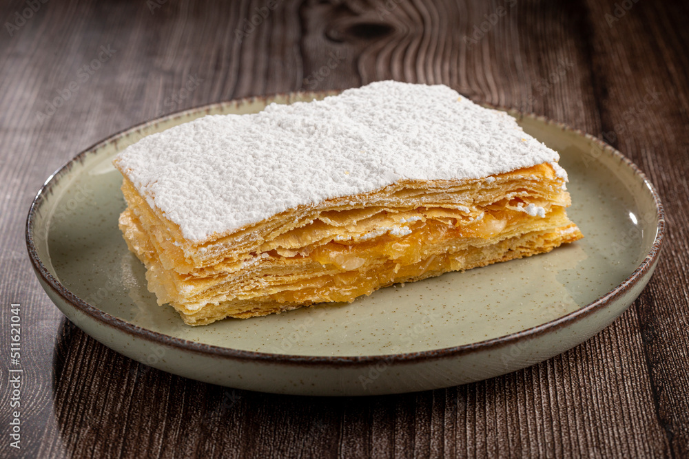 Mille feuille dessert on the plate. Mille feuille dessert on the plate.