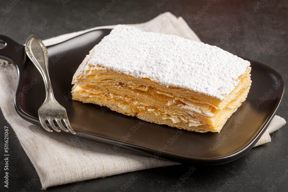 Mille feuille dessert on the plate. Mille feuille dessert on the plate.