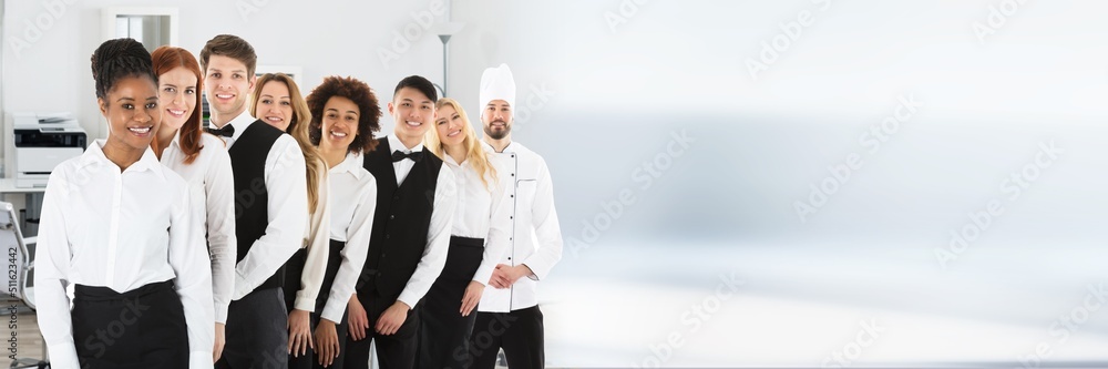Confident Restaurant Staff Standing In Row Confident Restaurant Staff Standing In Row