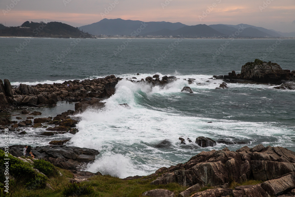 waves crashing on rocks in brazil