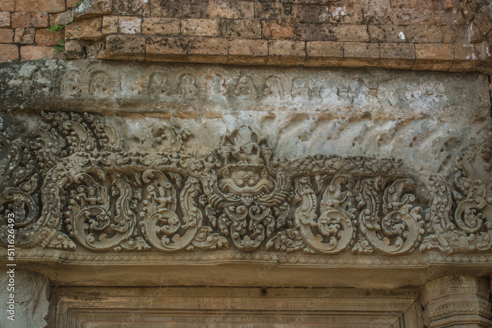 An unfinished sandstone lintel sculpture on the arch of Pre Rup Castle, an ancient castle in Siem Reap, Cambodia.