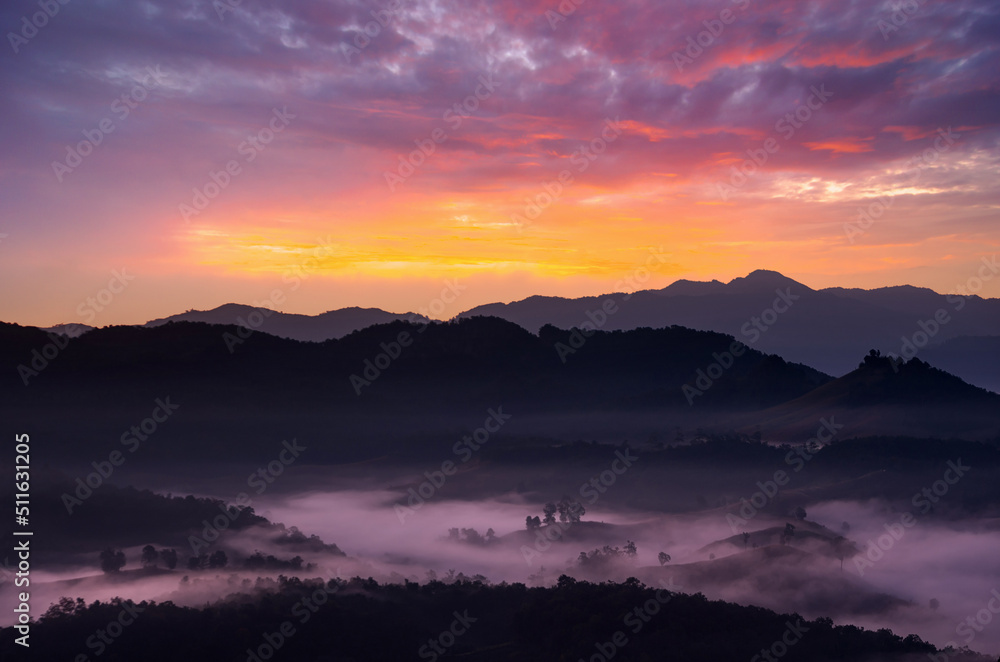 Aerial view Beautiful of morning scenery Golden light sunrise And the mist flows on high mountains, Baan Ja Bo, Mae Hong Son, Thailand.