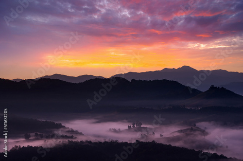 Aerial view Beautiful of morning scenery Golden light sunrise And the mist flows on high mountains  Baan Ja Bo  Mae Hong Son  Thailand.