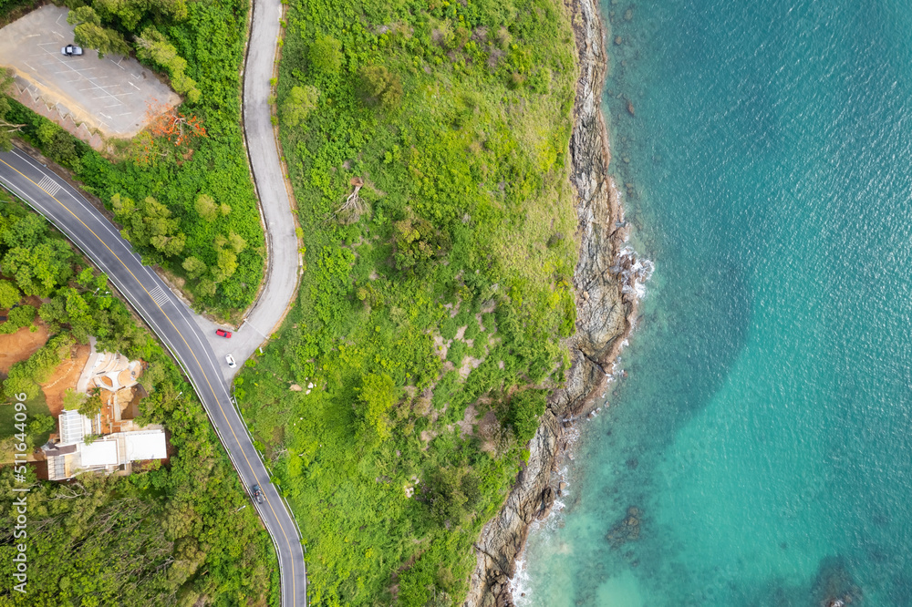 Aerial view of curve road along the seashore at Phuket Thailand beautiful seacoast and open sea in summer season Nature recovered Environment and Travel background