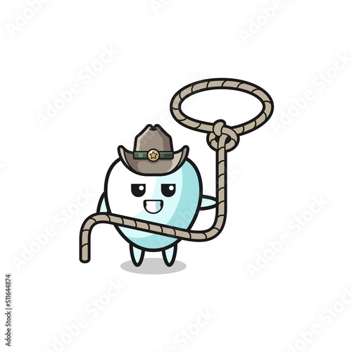 the tooth cowboy with lasso rope