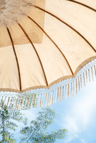 Bohemian aesthetic umbrella on a sunny day
