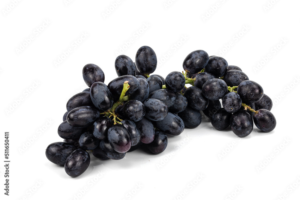 Black Grapes isolated in white background; water drops; studio lighting; macro detailing, negative space for copy