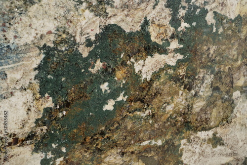 Close up of stone slab shows beautiful natural mineral pattern that perhaps flowed in Paleolithic period, resulted in stunning graphic in various forms under the crust. Unique in characters are formed