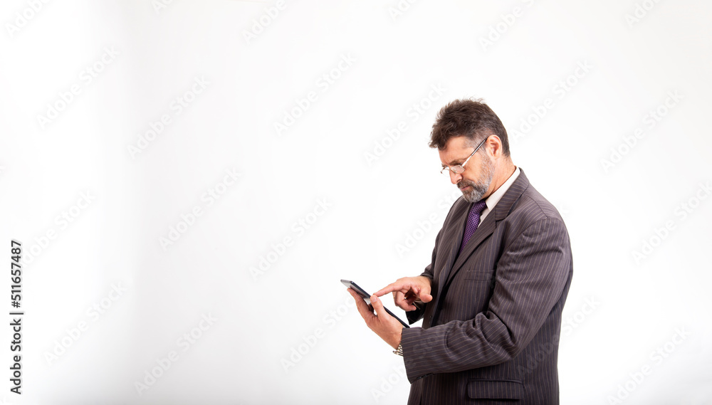 business concept portrait of young business using mobile phone man on white background business concept portrait of young business using mobile phone man on white background