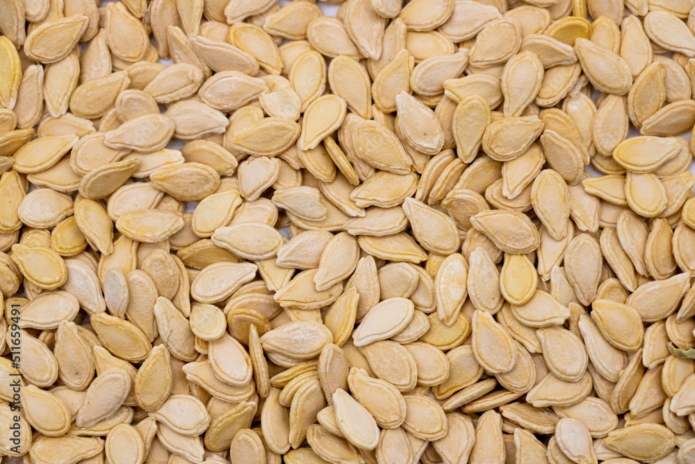 Pumpkin seeds isolated on white background. Pumpkin seeds isolated on white background.