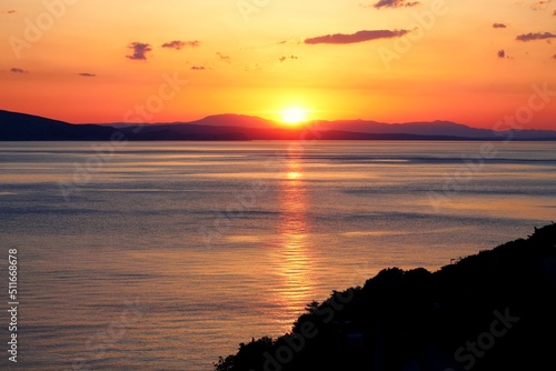sunset over a croatian bay photo