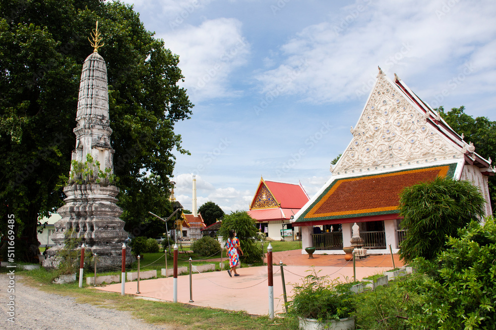 Ancient architecture building ubosot church and antique ruin stupa chedi for thai people travel visit and respect praying blessing holy mystery at Wat khien or Khian temple in Nonthaburi, Thailand