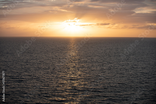 Calm ocean water. Golden sunset at the sea. landscape with sunset over the ocean.