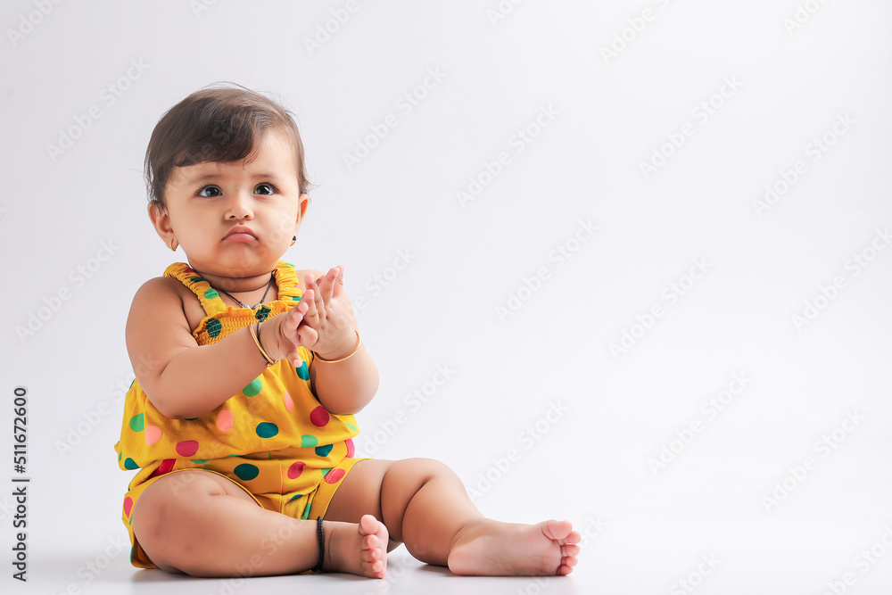 Cute indian baby girl smiling and giving expression. Cute indian baby girl smiling and giving expression.