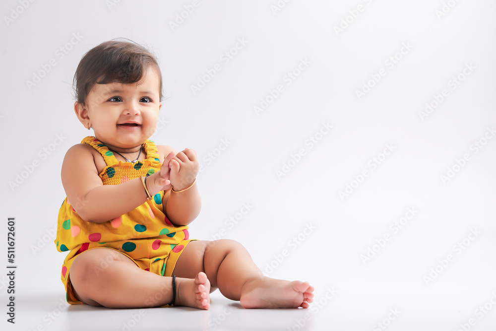 Cute indian baby girl smiling and giving expression. Cute indian baby girl smiling and giving expression.