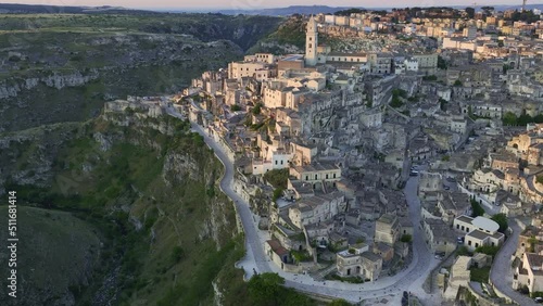 View from above, stunning aerial view of the Matera’s skyline during a beautiful sunrise. Matera is a city on a rocky outcrop in the region of Basilicata, in southern Italy.