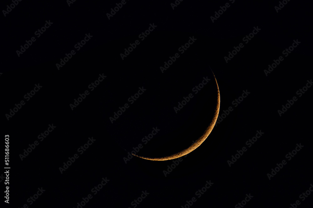The crescent moon in the night in June over Germany The crescent moon in the night in June over Germany