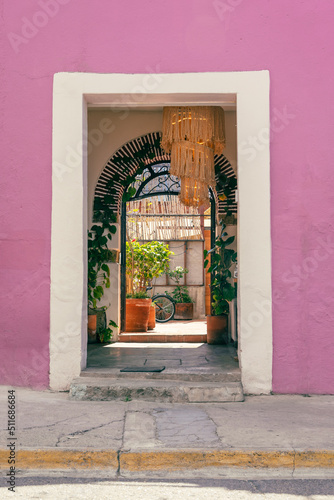 A beautiful doorway in Oaxaca, Mexico with pink wall, street photography