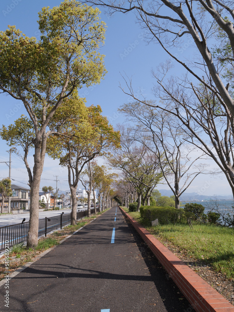 Nagahama City, Shiga Prefecture, Japan, April 1, 2022, roadway and sidewalk near the lake