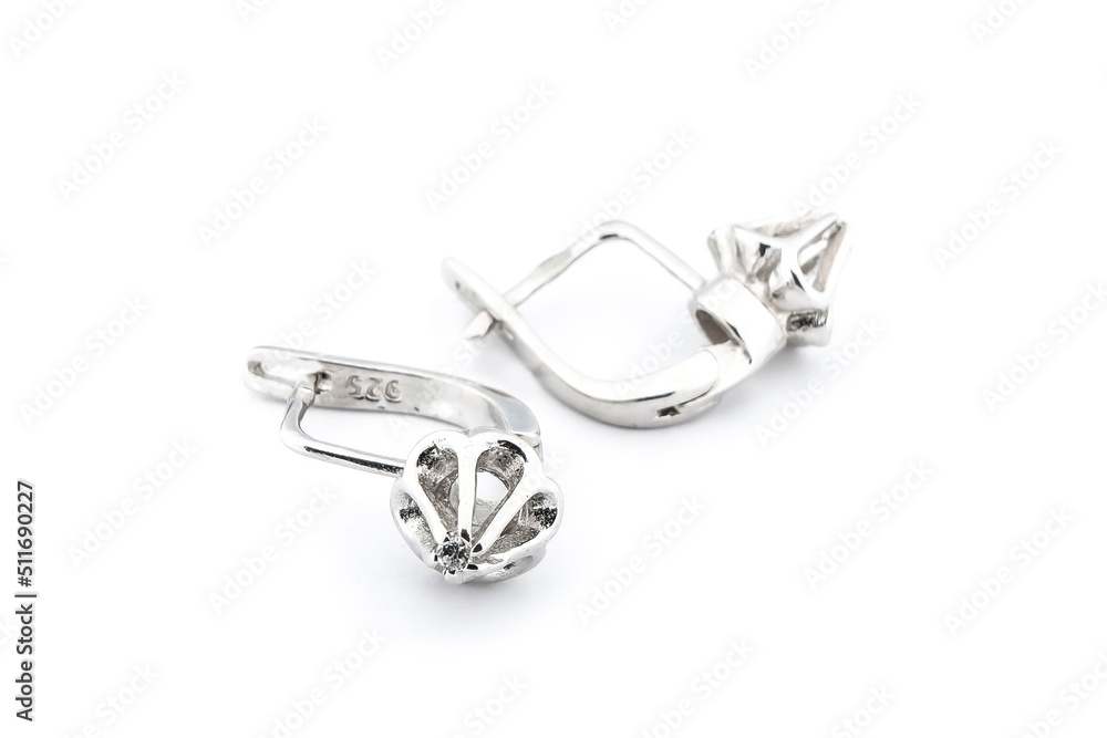 Luxury silver round earrings big jewelry for women isolated on white background, clipping path included Luxury silver round earrings big jewelry for women isolated on white background, clipping path included