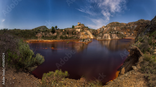 Obraz na płótnie Red lake from mining exploitation due to iron oxide