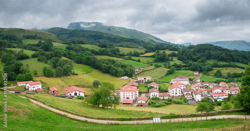 panoramic view of pyrenees mountains and countryside town, spain