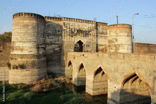 The ancient Lohagarh fort with the bridge across the river moat in the town of Bharatpur. photo