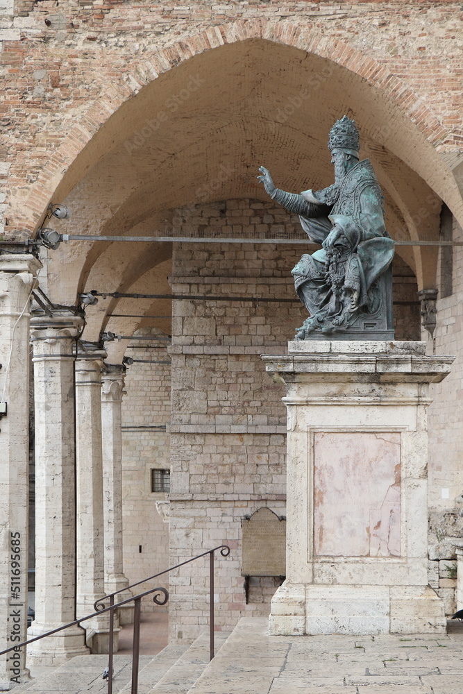 San Lorenzo Cathedral Exterior Detail with Archway and Bronze Statue in Perugia, Umbria, Italy