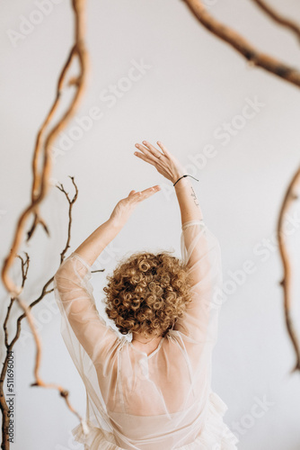 Fototapeta Naklejka Na Ścianę i Meble -  woman mysterious inside tree branch winding concept