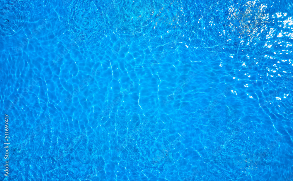 Abstract blue water surface background texture.