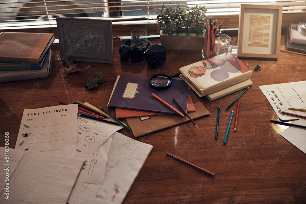 Where we live is where well learn. Shot of various school related items on a desk at home. Where we live is where well learn. Shot of various school related items on a desk at home.