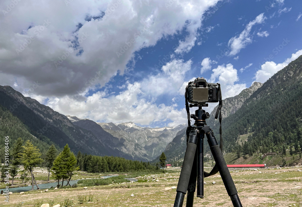 Camera standing on tripod for perfect landscape photography