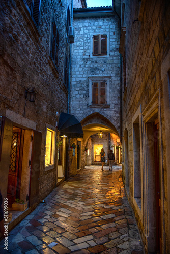 Evening view of the street of the old city. Kotor, Montenegro. The Bay of Kotor is the beautiful place on the Adriatic Sea. Kotor, Montenegro. © Tryfonov