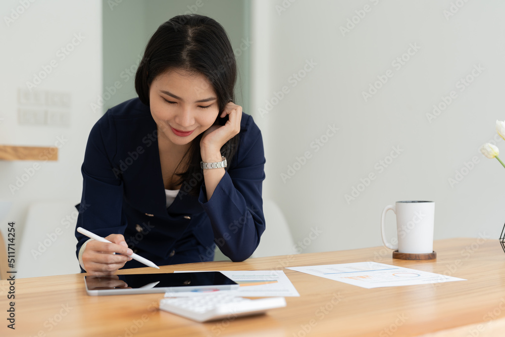 Close up hand of businesswoman using stylus pen signing contract on digital tablet on office table. Business manager proofing e-document, electronic signature, e-signing mobile app Close up hand of businesswoman using stylus pen signing contract on digital tablet on office table. Business manager proofing e-document, electronic signature, e-signing mobile app