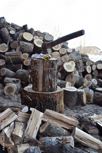Stacked firewood, prepared for home heating, winter preparation, firewood storage, firewood log stack