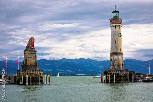 The famous harbor entrance of Lindau Bavarian Lion and New Lighthouse on Bodensee lake view