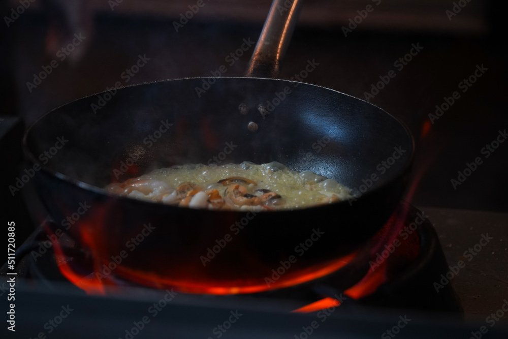 pan-fried shells in wine sauce. photo inside. pan-fried shells in wine sauce. photo inside.