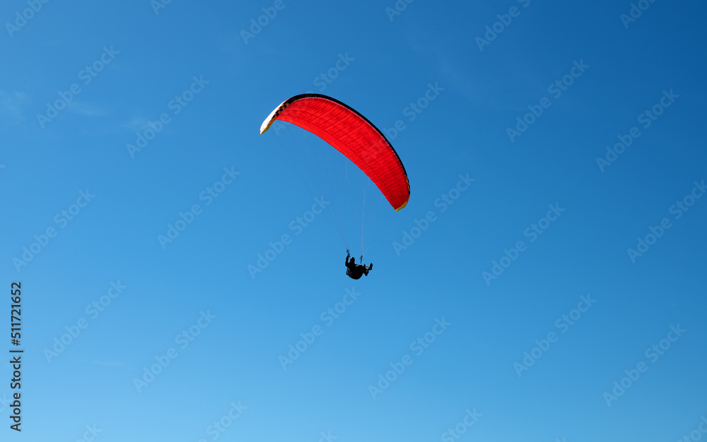 The sportsman flying on a paraglider. Silhouette on blue sky.
Paragliding take off. Travel destination. Summer and holiday concept. The sportsman flying on a paraglider. Silhouette on blue sky.
Paragliding take off. Travel destination. Summer and holiday concept.