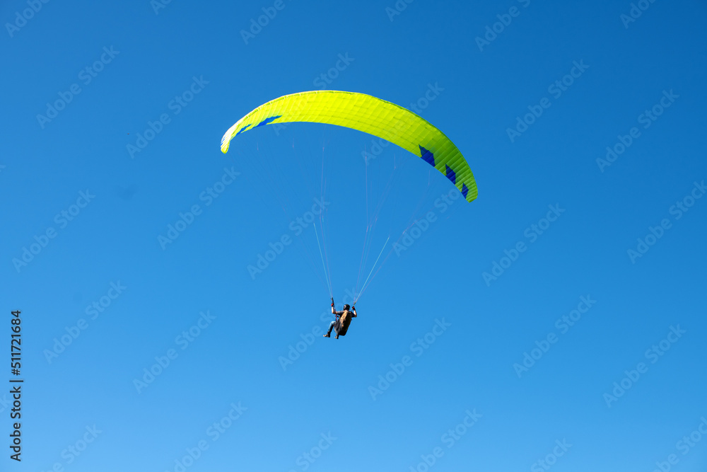 The sportsman flying on a paraglider. Silhouette on blue sky.
Paragliding take off. Travel destination. Summer and holiday concept. The sportsman flying on a paraglider. Silhouette on blue sky.
Paragliding take off. Travel destination. Summer and holiday concept.