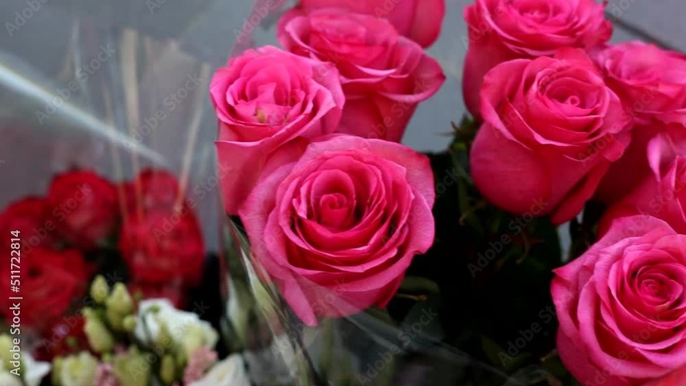 Bouquet of pink roses close up. Flowers close-up in the store. Bouquet of pink roses close up. Flowers close-up in the store.
