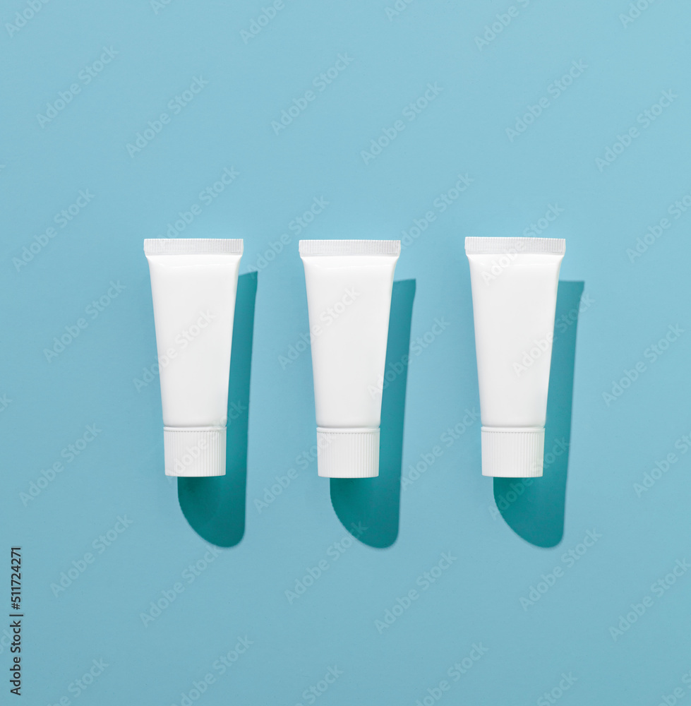 Dental floss case on blue background. Daily dental care. Advertising concept Dental floss case on blue background. Daily dental care. Advertising concept