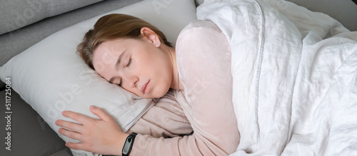 Woman sleeping in bed. Circadian rhythm optimization. Fight insomnia.Recovery of health in a dream