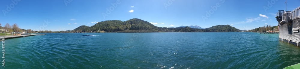 Panoramic view of popular lake klopein in carinthia in austria. travel and holiday concept.