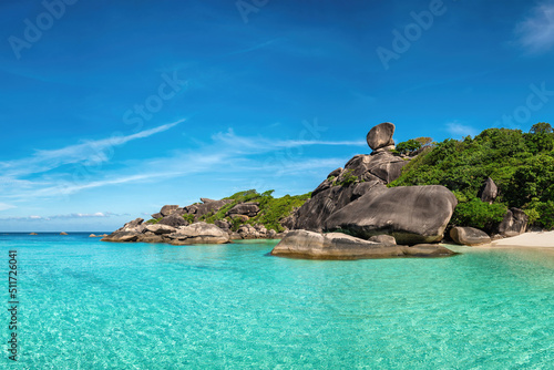 Obraz na płótnie Tropical islands of ocean blue sea water and white sand beach at Similan Islands with famous Sail Rock, Phang Nga Thailand nature landscape w salonie