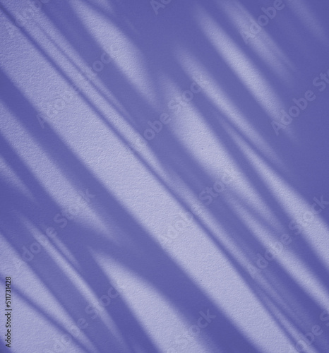 Fotótapéta Natural shadow overlay clean minimal background with color of the year 2022, very peri, periwinkle blue hue