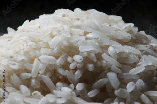 heap of white rice taken in close-up 